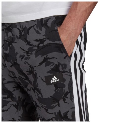 Брюки adidas SPORTSWEAR FUTURE ICONS CAMO GRAPHIC